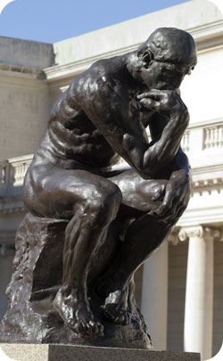 The thinker sculpture used to represent the 27th anniversary symbol